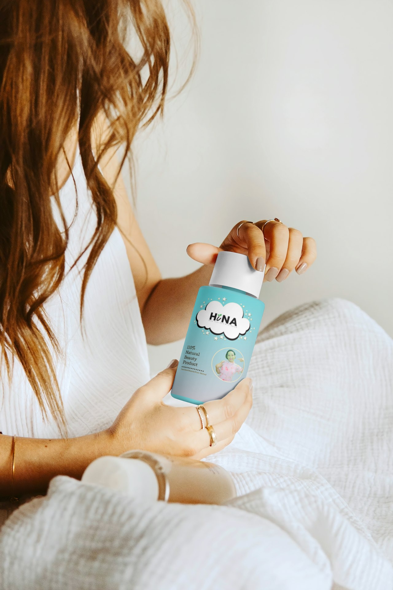 Two each of gray, white, and black shirts laying flat.